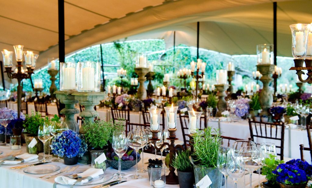 A stretch tent structure set up for a wedding