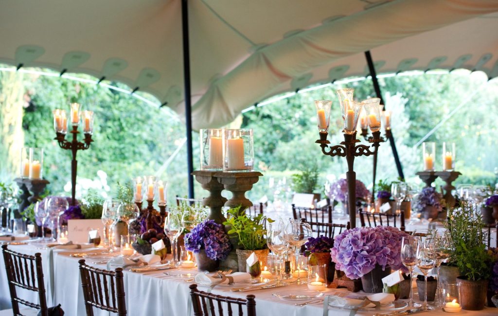 A stretch tent structure set up for a wedding
