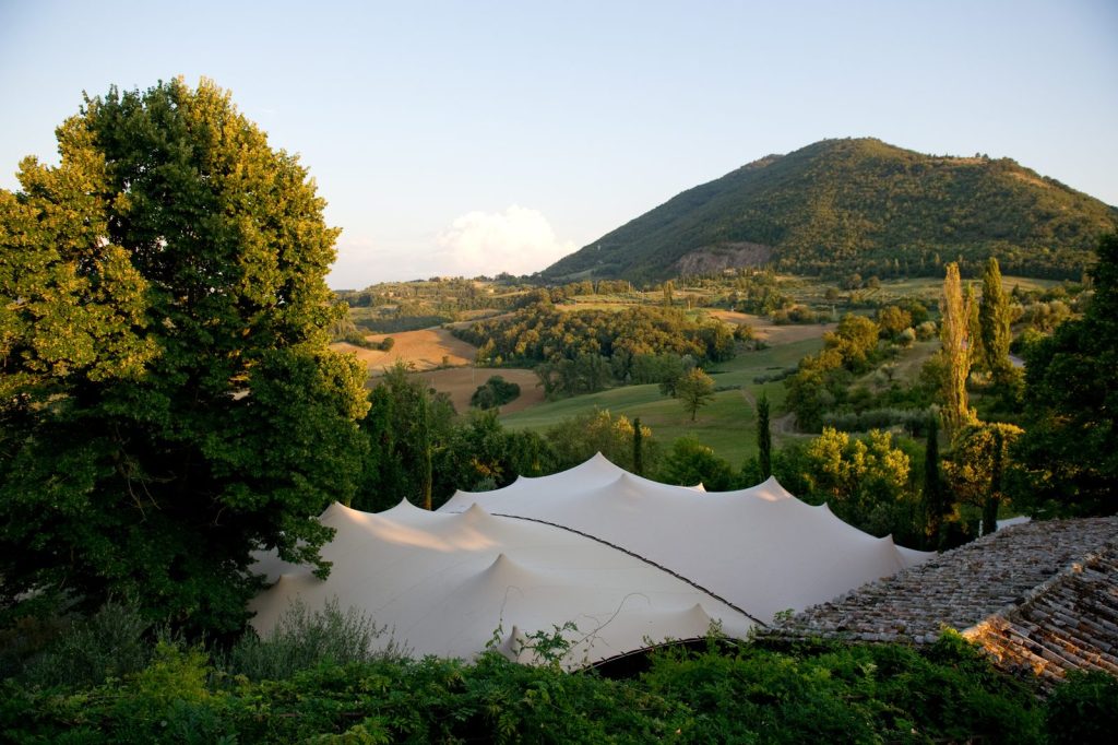 A stretch tent structure set up for a wedding