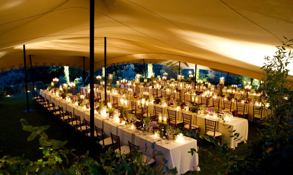A stretch tent structure set up for a wedding