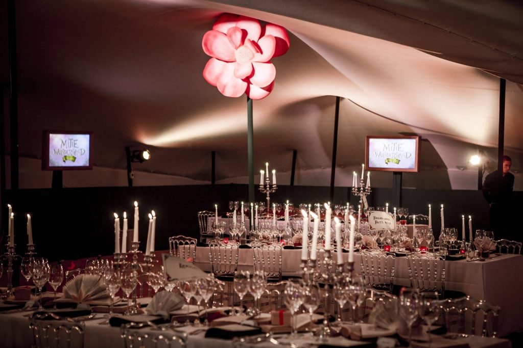 A stretch tent structure set up for a wedding